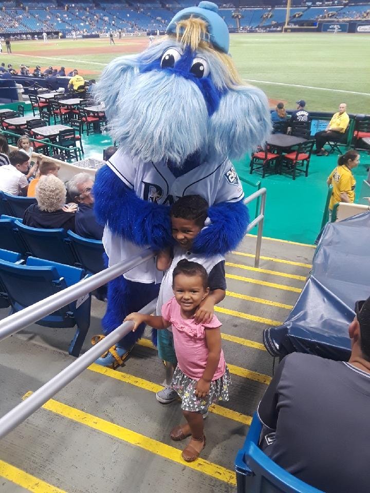 Tampa Bay Rays' mascots DJ Kitty and Raymond perform for the crowd