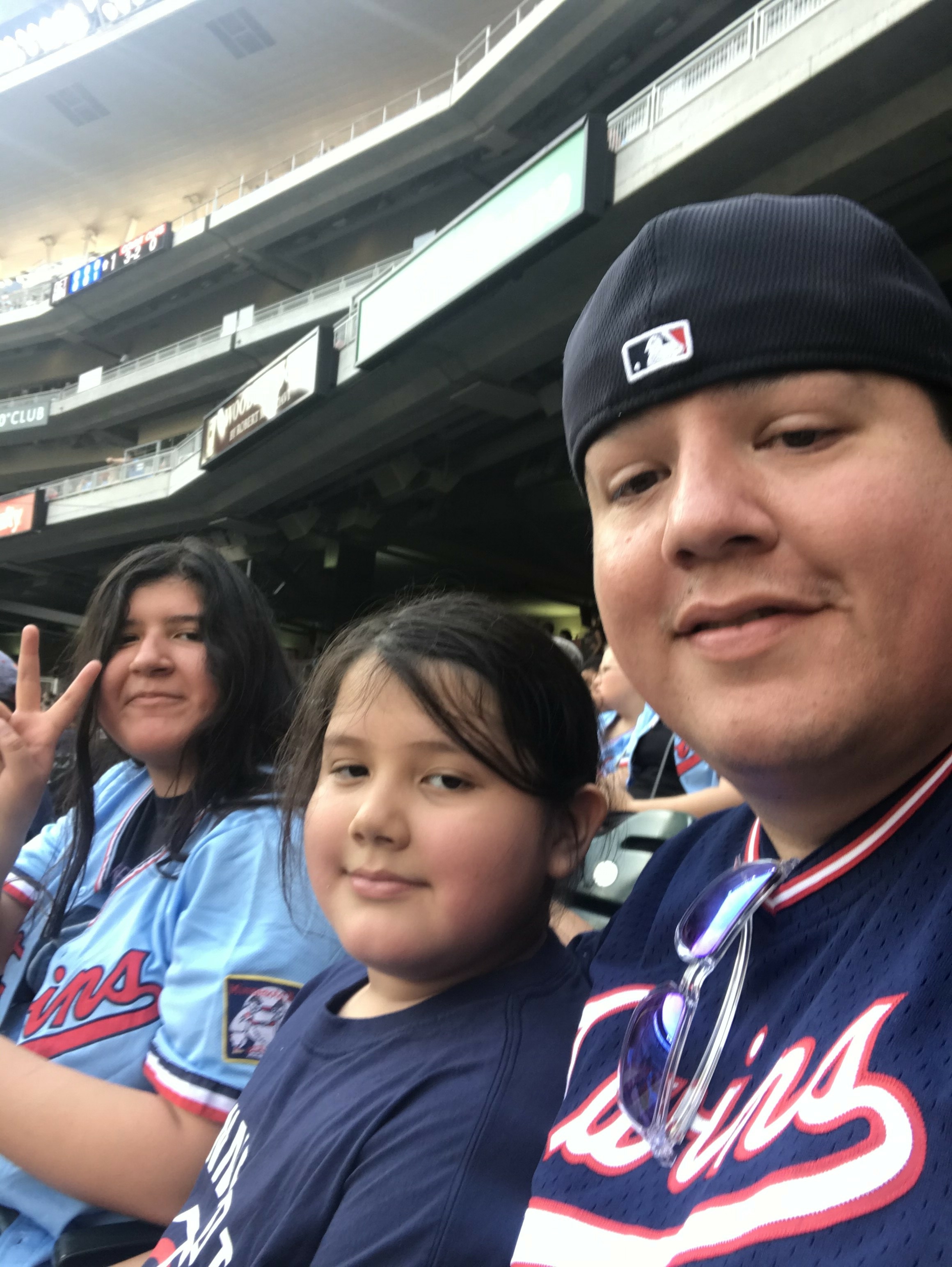 The Texas Rangers banned a fan after a Hispanic family says he harassed  them at a game