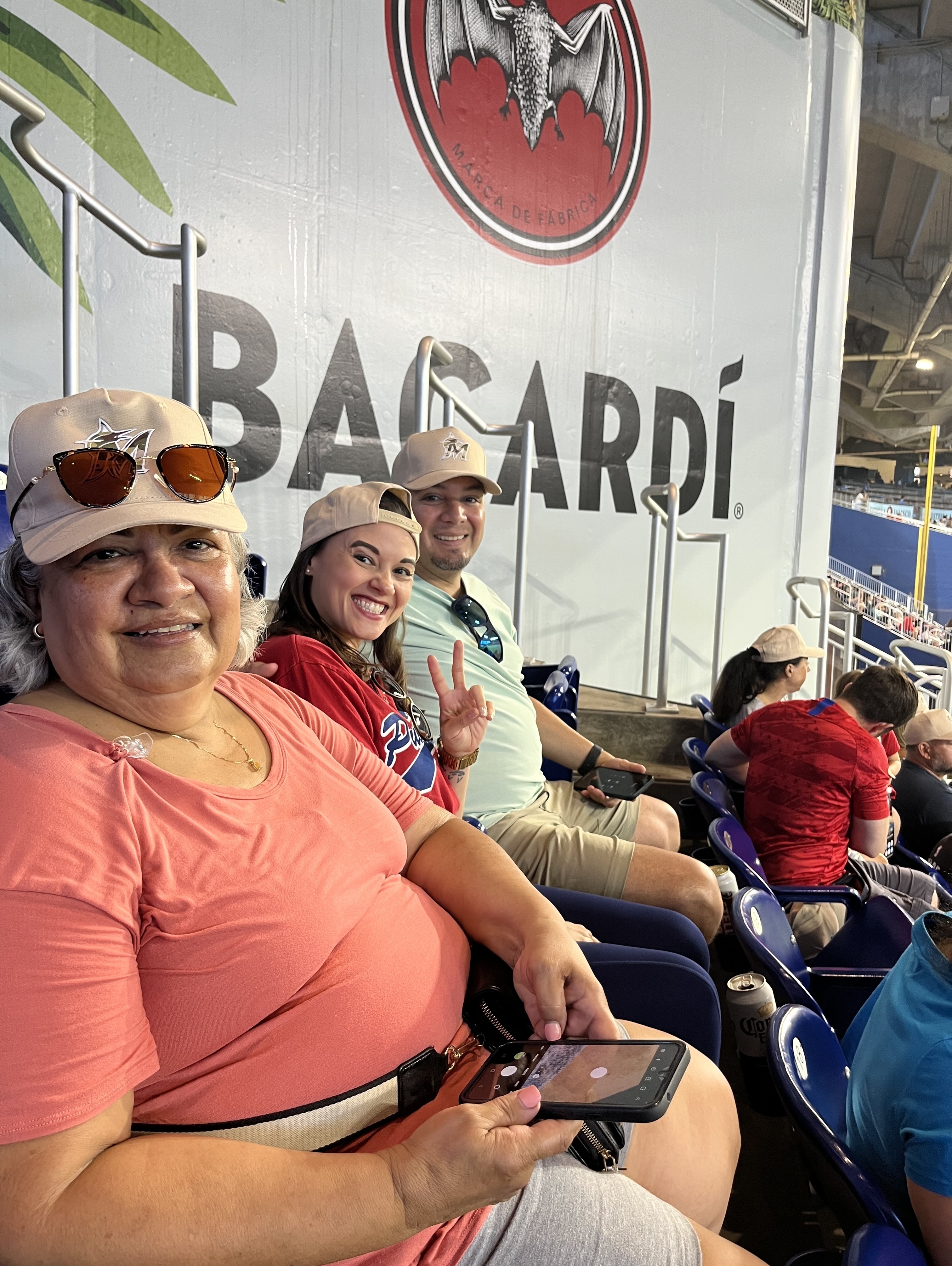 Baseball fans stand during the singing of the National Anthem before the  start of a baseball game between the Miami Marlins and the St. Louis  Cardinals, Wednesday, June 12, 2019, in Miami. (